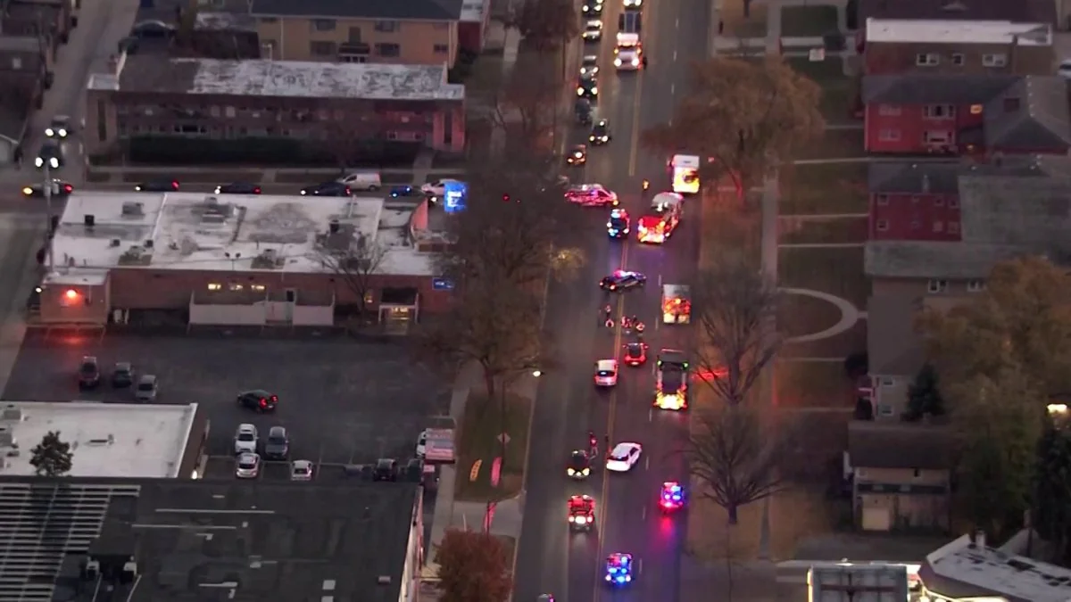 Large police response blocks street prompting traf 20251116 101250
